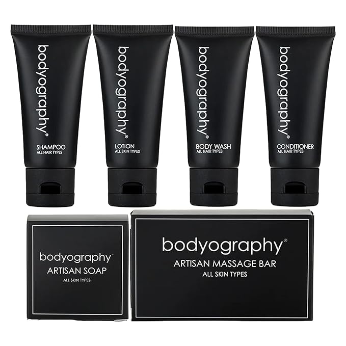 Bodyography Toiletry Kit, 6 Piece Set Shampoo, Conditioner, Body Wash, Lotion, Hand Soap, Massage Bar, Clear Travel Bag